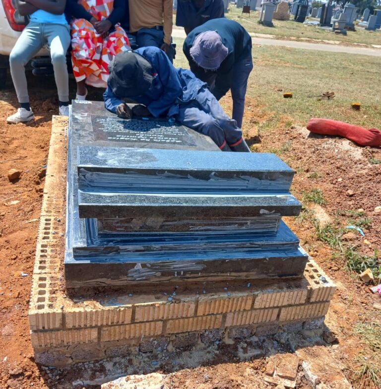 Engraving a tombstone